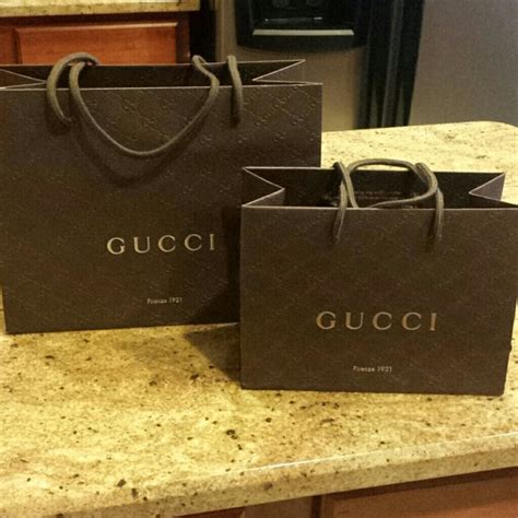 gucci stoure a hunded thou|Gucci shopping bag.